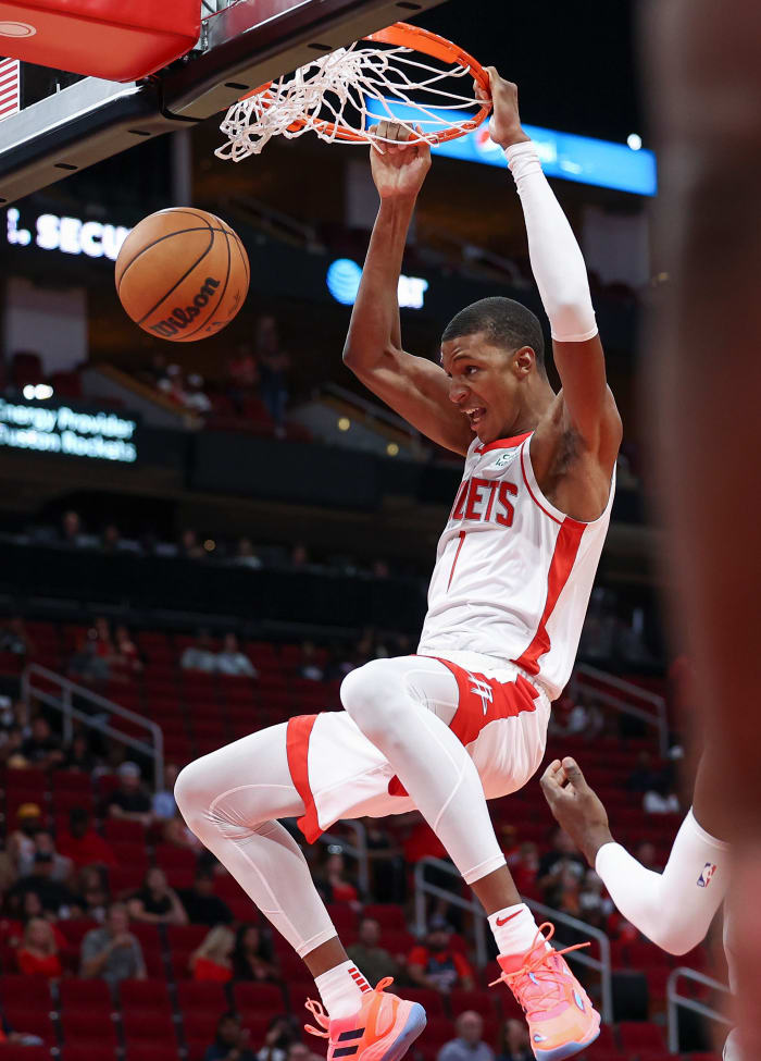 Oct 2, 2022; Houston, Texas, USA; Houston Rockets forward Jabari Smith Jr. (1) dunks the ball during the first quarter against the San Antonio Spurs at Toyota Center. Mandatory Credit: Troy Taormina-USA TODAY Sports